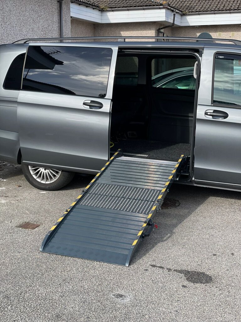 fixed folding ramp attached to large car