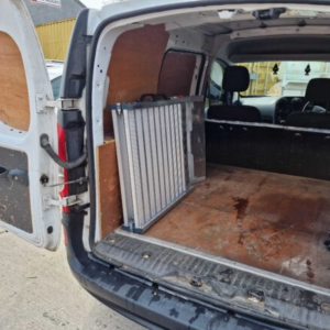 portable van ramp stored in van