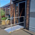 A versatile modular wheelchair ramp installed to improve building accessibility.